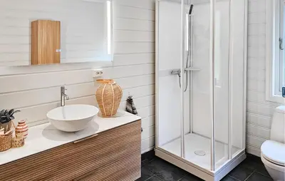 a bathroom with a sink and a shower at Stunning Home In Hebnes With Kitchen in Hebnes