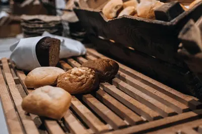 a bunch of different types of bread on a grill at Quality Hotel Ålesund in Ålesund