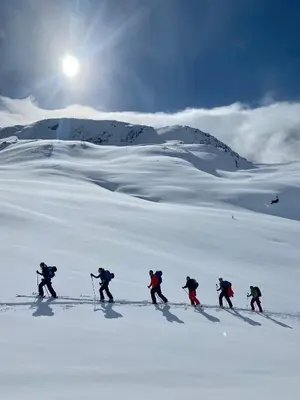 a group of people on skis in the snow at Lodge Visnes Stryn in Stryn
