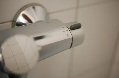 a toaster sitting on a wall next to a sink at Førde Sommarhotell in Førde