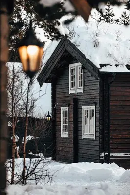a small wooden house with snow on the roof at Bardøla Fjelltun in Geilo