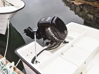 a helmet on the bow of a boat in the water at 5 person holiday home in Selje-By Traum in Selje