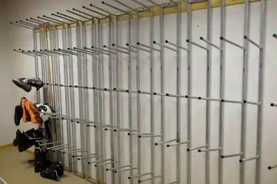 a row of metal pipes in a garage at Fjelltun Fritidsleiligheter, leilighet 407 in Geilo