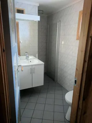 a bathroom with a sink and a toilet at Granbu in Geilo