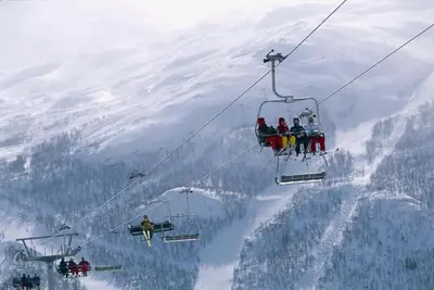 a group of people riding on a ski lift at Fresh Familie Hytte Hemsedal with Outdoor Sauna in Hemsedal