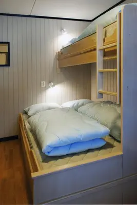 a bedroom with two bunk beds in a room at Alpin Apartments Solsiden in Hafjell