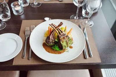 a plate of food on a table with a plate of food at Panorama Hotell & Resort in Steinsland
