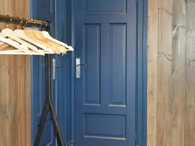 a blue door in front of a blue door at 5 person holiday home in Fåvang-By Traum in Favang