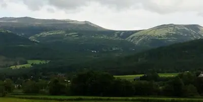 a view of a valley with mountains in the background at Tronsvangen Seter in Alvdal