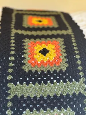 a rug with a flower design on it at Eikum Hotel in Hafslo