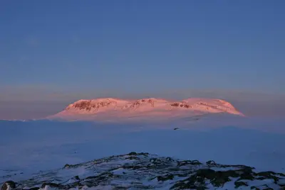 a mountain covered in snow in the distance at Havsdalsgrenda Geilo Apartments in Geilo