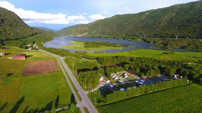 an aerial view of a river and a road at Birkelund camping in Geilo