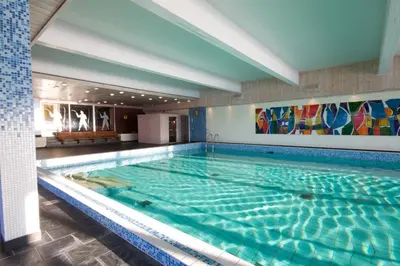 a large swimming pool in a building at Rauland Høgfjellshotell in Rauland