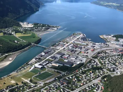 an aerial view of a city and a river at Åndalsnes gustehouse in Åndalsnes