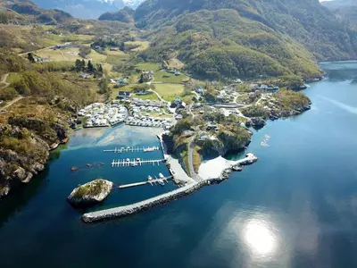 an aerial view of a small harbor in a lake at Kyrping Camping in Kyrping