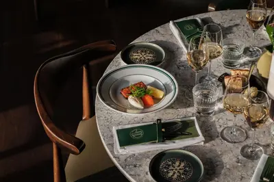 a table with a plate of food on it at Clarion Hotel Trondheim in Trondheim