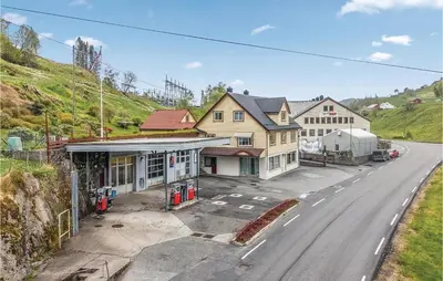 an aerial view of a street with houses and a road at 5 Bedroom Lovely Home In Seim in Seim