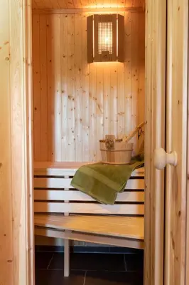 a sauna with a bench in a wooden cabin at Valley View in Stranda