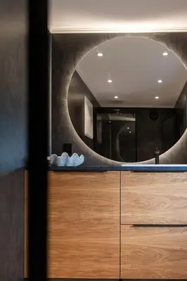 a bathroom with a sink and a mirror at Nordica Resort Florø in Florø