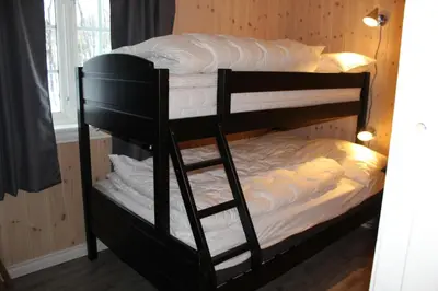 a couple of bunk beds in a room at Bergestua - 4 bedroom cabin in Gol