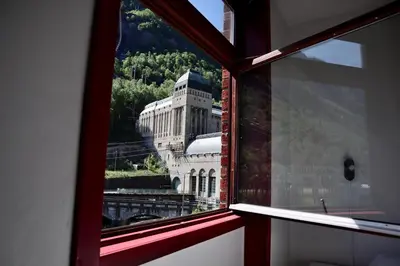 a view of a building from a window at Rjukan Gjestehus in Rjukan