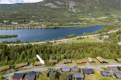 an aerial view of a village next to a lake at Sørlia hytte in Hafjell