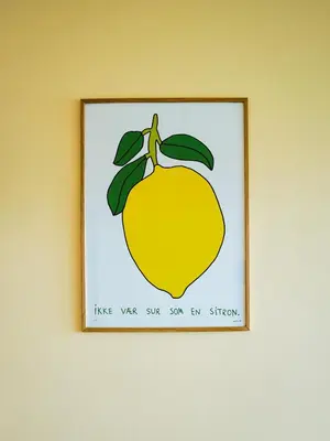 a picture of a lemon hanging on a wall at Balestrand Hotel in Balestrand