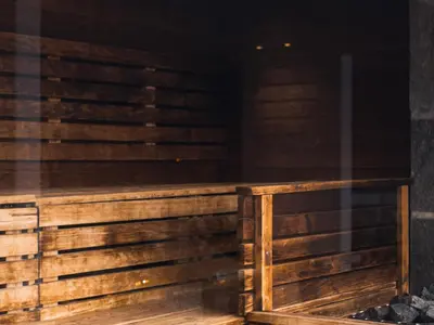 an empty sauna with a wooden fence at Hotel Ullensvang in Lofthus