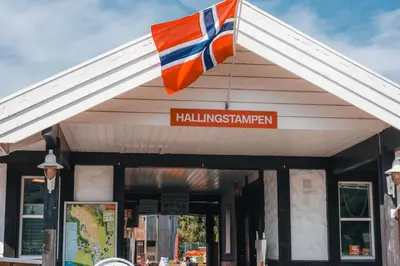 a flag hanging from the front of a building at First Camp Gol Hallingdal in Gol