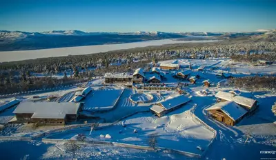 an aerial view of a resort covered in snow at Langedrag Naturpark in Tunhovd