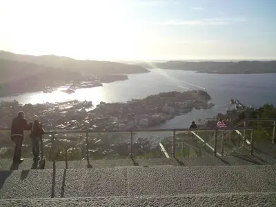 a group of people looking at a view of a lake at Central location in the heart of historic Bergen in Bergen