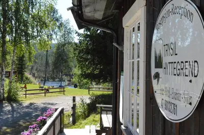 a sign on the side of a building at Trysil Hyttegrend in Trysil