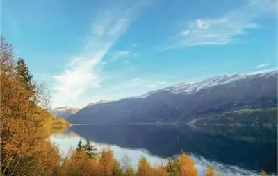 a view of a lake in the middle of mountains at 3 Bedroom Lovely Home In Vallavik in Vangsbygd