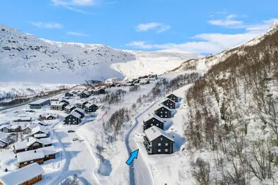 an aerial view of a village in the snow at Røldal in Røldal