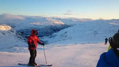 a person is standing on skis in the snow at Røldal in Røldal