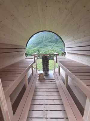 a inside of a sauna with a round window at Gudvangen Camping in Gudvangen
