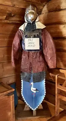 a statue of a man in a wooden cabin at Kjørsvik Øvre in Tornes