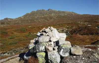 a pile of rocks on top of a mountain at Four-Bedroom Holiday Home In Eggedal in Eggedal