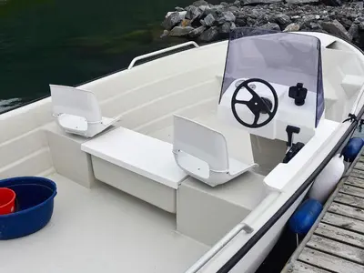 a boat with two computers on the front of it at 10 person holiday home in Brattvåg in Brattvåg
