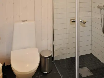 a bathroom with a toilet and a shower at 10 person holiday home in Øyer in Øyer
