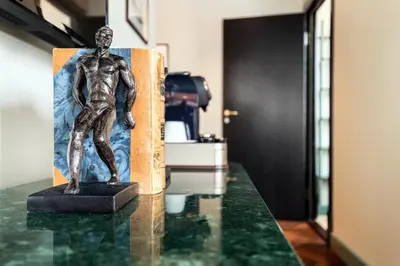 a statue of a man standing on a table at Fýri Resort in Hemsedal