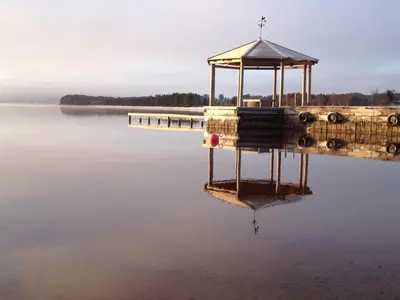 a gazebo in the middle of a lake at Osensjøen Camping in Valmen