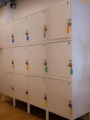a group of lockers in a room at Blue House Dormitory in Odda
