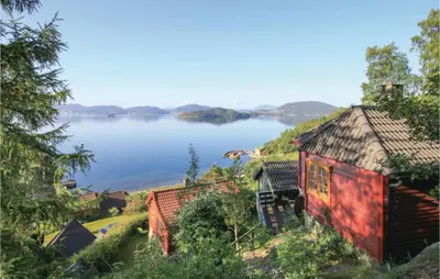 a view of a lake with houses and trees at Nice Home In Valen With Wifi in Valen