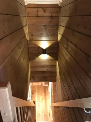 an empty sauna with a light in the middle at Harpefossen Skisenter og Hyttegrend in Nordfjordeid