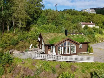an image of a house with a grass roof at Serene Waterfront Retreat-By Traum in Valevåg
