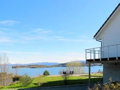 a view of a lake from a house at Apartment Galanten by Interhome in Lunde