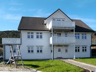 a house with a ladder in front of it at Apartment Galanten by Interhome in Lunde