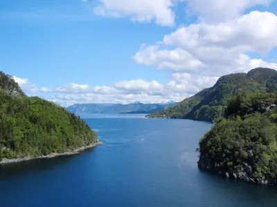 a view of a river between two mountains at Holiday Home Tufto by Interhome in Lunde
