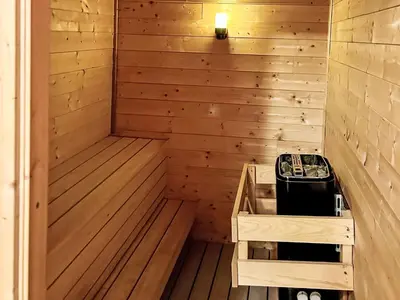 a wooden sauna with a light on top at Holiday Home Elistova by Interhome in Onarheim